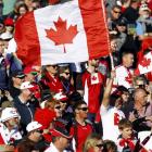 Canada fans cheer before their Rugby World Cup Pool A match against Japan at McLean Park in...