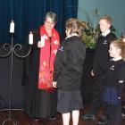 Candles are lit at the church service marking the 50th anniversary of the Maniototo area St John...