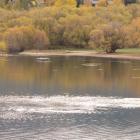 Canoeist on Lake Hayes near Arrowtown. Photo by Tracey Roxburgh.
