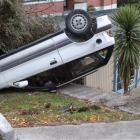 Otago Highlanders prop Keith Cameron inspects the car which woke him when it came close to...