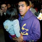Carlos Tevez with one of his daughters in Buenos Aires earlier this month. Tevez will face...
