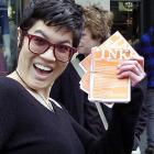 Carmen Norgate brandishes the offending publication outside the Golden Centre.