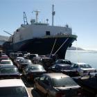 Cars imported from Japan lined up on the wharf at Port Chalmers could soon become less common....