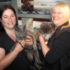 Cat fosterer Ave Migias (left), of Frankton, with the nearly 2-year-old cat Mochi. Ms Migias...