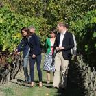 Catherine, the Duchess of Cambridge, and Prince William, the Duke of Cambridge, walk through the...