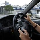 A University of Otago professor, Liz Franz, wants drivers to be banned from any use of cellphones...