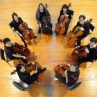 Cellists of Otago (clockwise from bottom left): Heleen Du Plessis (concert leader), Myles Chen,...