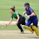 Central Districts Kate Broadmore fields off her own bowling to run out Otago's Rebecca Heenan...