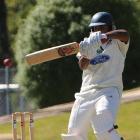 Central Districts lower order batsman Tarun Nethula plays a cut shot during his innings of 58 on...