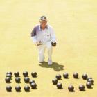 Charlie Burrell holds his favourite bowl at the Taieri Bowling Club yesterday. Photo by Peter...