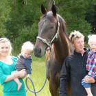 Charlotte Neilson, Charley (17 months), Harry (2) and trainer Alex Freeman. Photos by Matt Smith.