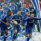Chelsea players (l-r) Didier Drogba, Cesc Fabregas and Eden Hazard celebrate their team's League...