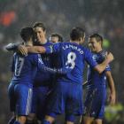 Chelsea's Fernando Torres (2nd L) celebrates scoring against Leeds United during their English...