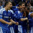 Chelsea's Frank Lampard (2nd R) celebrates with teammates after scoring during their FA Cup...