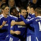 Chelsea's Frank Lampard (C) celebrates with teammates after scoring with a penalty against Fulham...