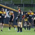 Chiefs and Hurricanes players look dejected as their match ends in an 18-18 draw. Credit:NZPA /...