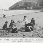 Children building a sandcastle on St Clair beach, Dunedin. 
- Otago Witness, 23.3.1910.