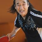 Chinese table tennis coach Wang Qi gives a demonstration at College Street School in Caversham...