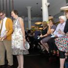 Chris and Julie Wilson model clothes from the 1950s in the Back to the Future Fashion Show at...