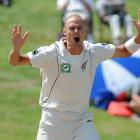 Chris Martin reacts while bowling against Pakistan during the first test in Hamilton earlier this...