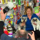 Chrissy Watherston, at the Veterinary Centre in Kurow, poses with dog Theo and cat Cocee for...