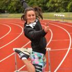 Christina Ashton celebrates her NCEA results during a hurdle training session at the Caledonian...
