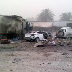 Civilians gather at the site of a car bomb attack at Jadidat al-Shatt in Diyala province, 40km...