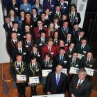 The Class Act 2012 group poses with Prime Minister John Key and Allied Press business manager...