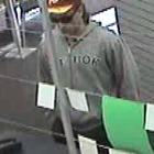 Security camera photo of the Exchange Post Shop offender.