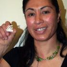 Clutha's sole Olympian, Verina Wihongi, proudly displays the Olympic pin  presented to her by...