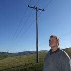 Coal Creek farmer Gerry Eckhoff has sent Delta a rental bill for the 50 power poles on his land....
