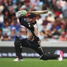Colin Munro launches another big shot on his way to 50 off 14 balls. Photo Getty