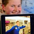 Columba College pupil Ailsa Carroll with a photo of herself, taken in the International Space...
