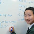 Columba College pupil Chiao Lin practises some mental arithmetic during her lunch break in...