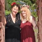 Actors Sarah McDougall (left) and Elsa May at the entrance of the McDougall's back garden in...