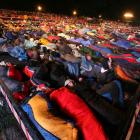 Thousands sleep out in sleeping bags for the dawn parade.