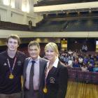 Commonwealth Games gold medallists Ben Smith (left) and Alison Shanks with mayor Dave Cull at a...
