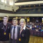Commonwealth Games gold medallists Ben Smith (left) and Alison Shanks with mayor Dave Cull at a...