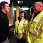 Community guides Tamah Carson and Mike Blissett catch up on the night's activities with Nathan...