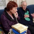 Concerned Dunedin resident Sue Harvey speaks to HealthCare New Zealand Dunedin manager Graeme...