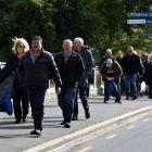 Concert-goers make their way to Forsyth Barr Stadium in Dunedin for Fleetwood Mac. Photo by...