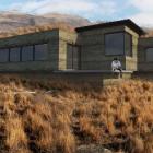 Precast concrete mountain retreat with sustainable 'air tube' and geothermal heat sources.