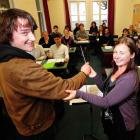 Conducting teacher Holly Mathieson assists University of Otago summer school student Stacey Moir...