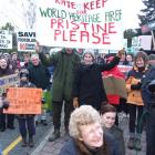 Conservation Minister Kate Wilkinson is surrounded by protesters in Te Anau yesterday. Photo by...