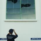 Constable Johnathan Pearce photographs smashed windows at Dunedin Hospital's therapeutic pool...
