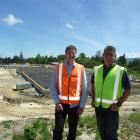 Cook Brothers Construction project manager Glenn Forrester (left) and West Otago Health Trust...