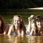 Cooling off in the Outram Glen, near Dunedin,  yesterday are Lynsey Macaskill (14), Georgia...