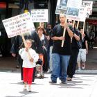 Coptic Christians march in Dunedin to condemn terrorism. Photo by Craig Baxter.