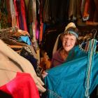 Costume mistress Margaret Jackson with some of the wares available for hire from the Taieri...