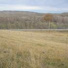 Could this be yours?... An empty quarter-acre section of land between this fence and Leask Rd ...
